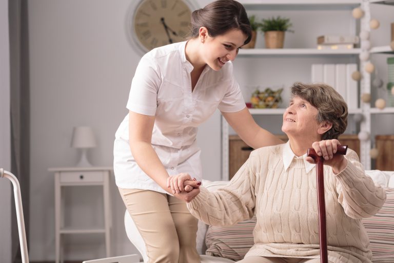 A safe, accessible home environment in a Leicestershire community featuring a professional care worker performing a safety check.